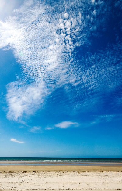 Cloud drifting over the beach