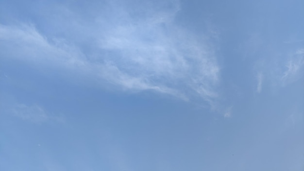 A cloud in the sky is visible from below.