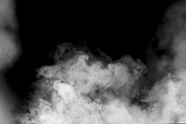 Cloud of white smoke on black background