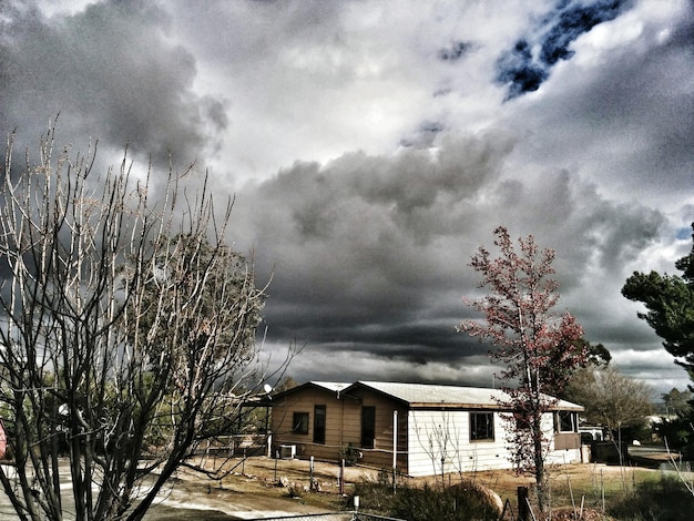 Photo clouds over building