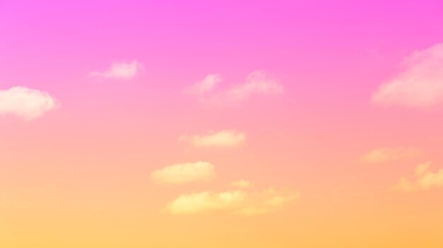 Clouds float in bright colors pink and orange