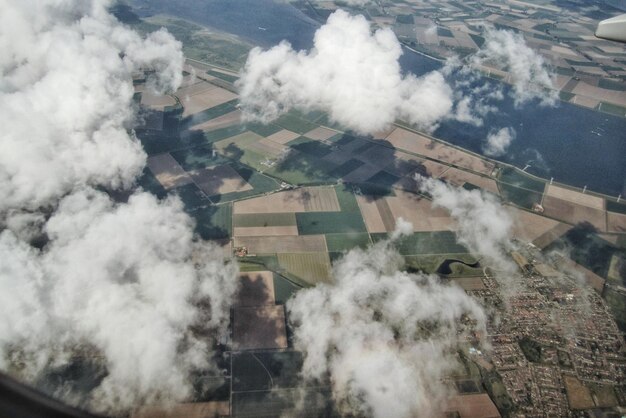 Photo clouds above landscape and river