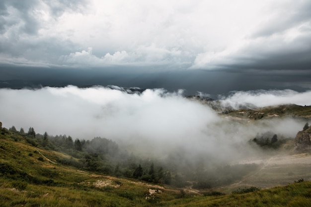 Clouds in lower mountain valley