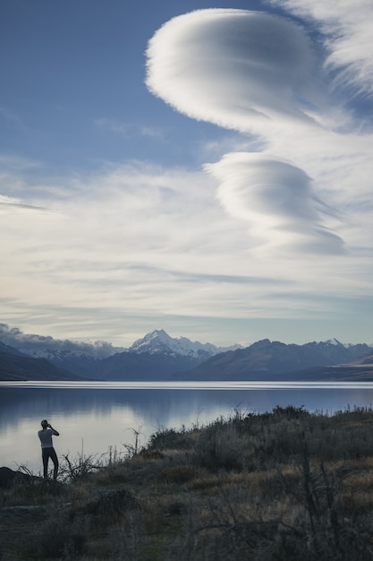 Photo clouds over mount cook new zealand