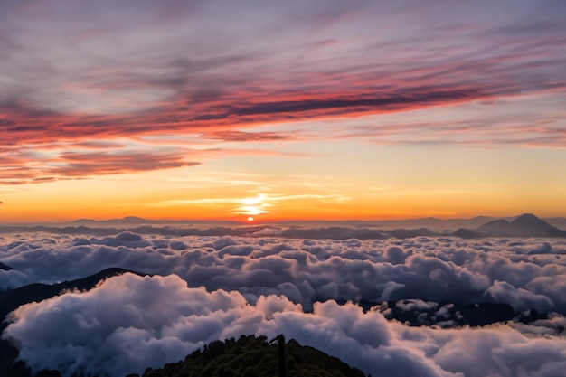 the clouds over the mountains are beautiful with a sunrise and very harmonious atmosphere