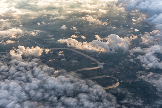 Over clouds and river with sunlight.