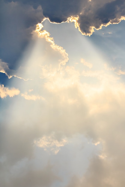 Clouds and sun beams on evening time