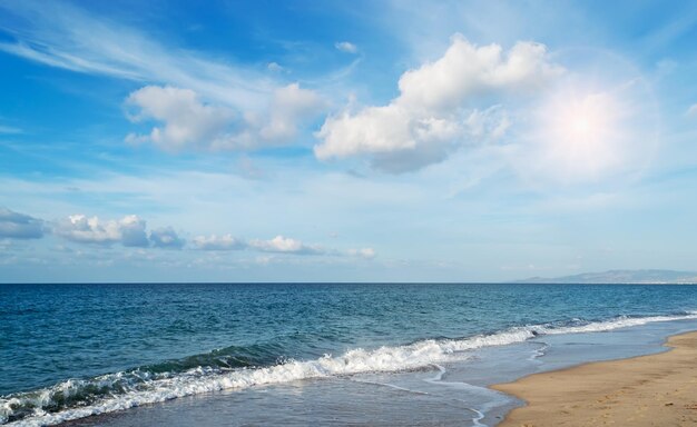 Clouds and sun over Platamona beach