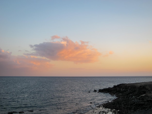 Cloudscape, Colored Clouds at Sunset near the Ocean