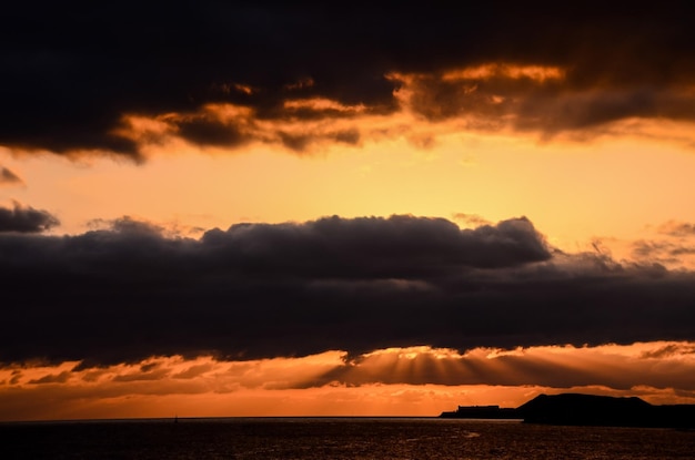 Cloudscape, Colored Clouds at Sunset near the Ocean