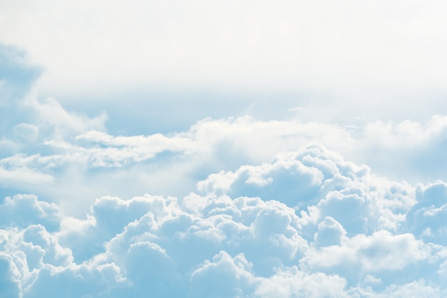 cloudscape with blue sky and white clouds
