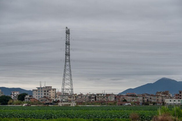 Cloudy days power facilities in the fields iron towers and telegraph poles