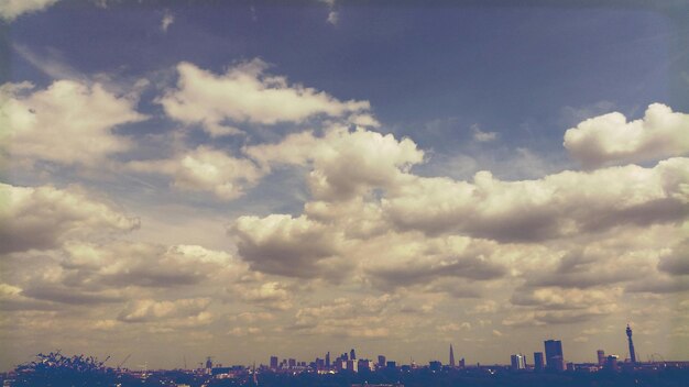 Cloudy sky over cityscape