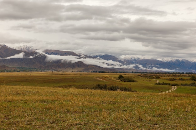 Cloudy sky and low clouds in the mountains of Kyrgyzstan