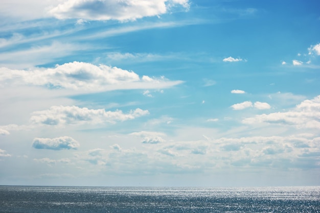 Cloudy sky and sea horizon and water into the infinity far from the bustle