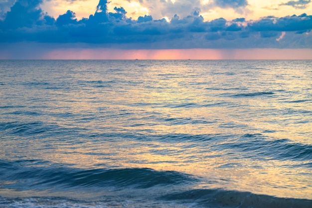 Cloudy sky on sea sunset sunrise on ocean beach sunset landscape in the sky after sunset sunrise