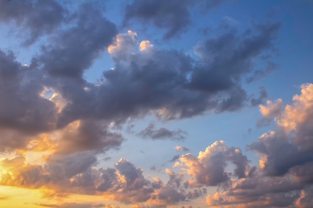 Cloudy sky with the sun at dawn early in the morning