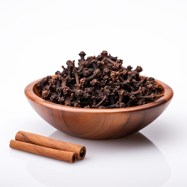 Photo a clove in bowl on white background