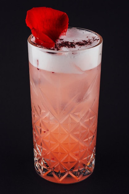 Clover club cocktail drink with raspberry and rose petal