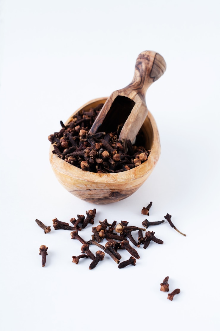 Photo cloves. dry seasoning for cooking and drinks isolated