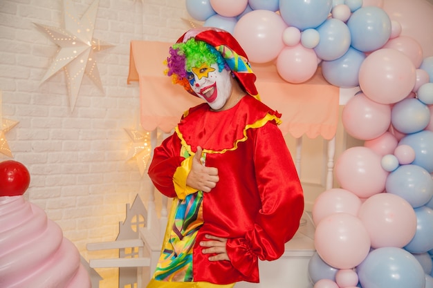 Clown boy at childrens party shows class