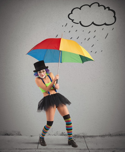 Clowns met regenboogparaplu