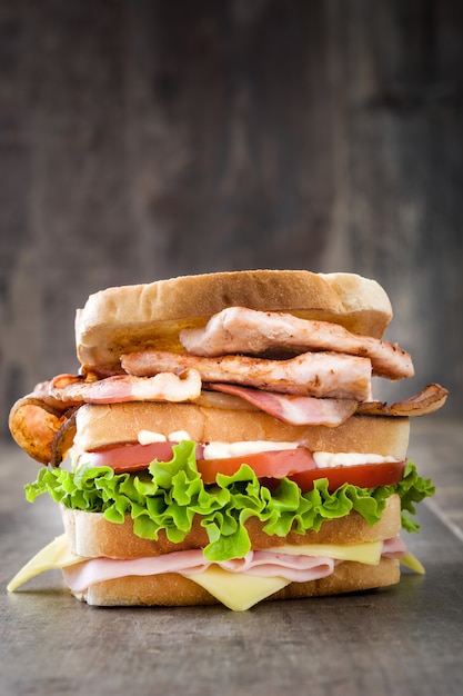 Club sandwich on wooden table