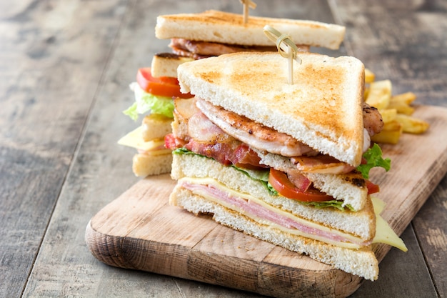 Club sandwich on wooden table