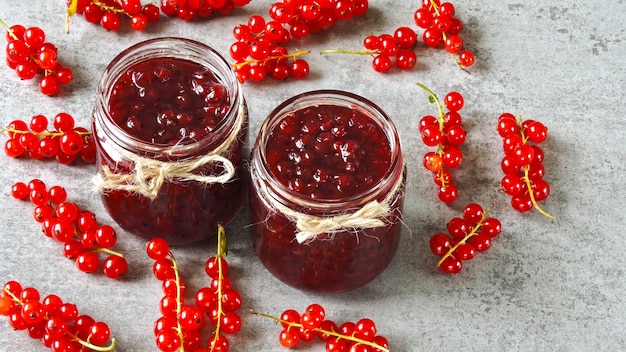 Clusters red currants and jam red currants