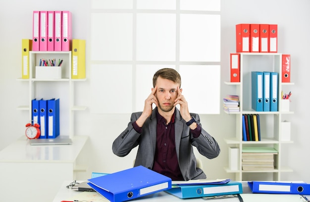 Cluttered mind agile business businessman making notes man wear office suit male realtor has hard working day online courses tutor leader of law office tired lawyer working with computer