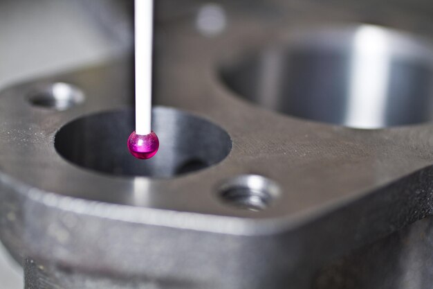 Photo cmm programming precision measurement in industrial setting with magenta probe