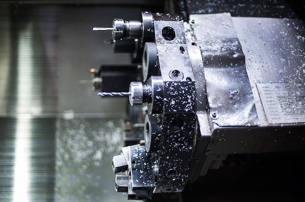 The CNC lathe machine. The hi-technology machining concept.