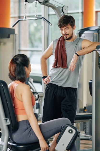 Coach talking to female client