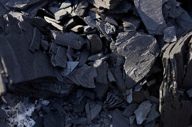 石炭のクローズアップ。黒炭の背景
