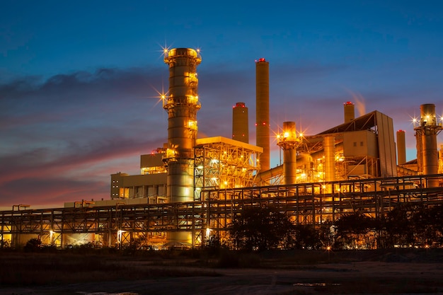 Coal electricity substation smokestack and power plant beautiful twilight sunset