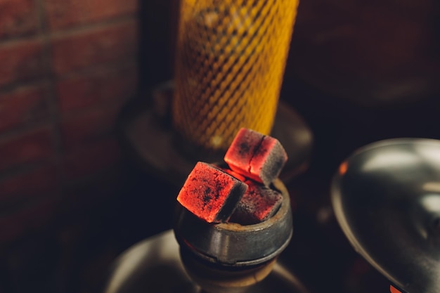 Coals for hookah closeup Burning coals on the hookah bowl