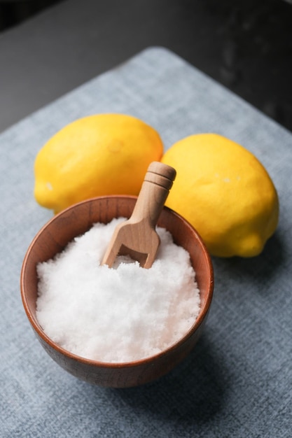 Coarse salt in a bowl on table