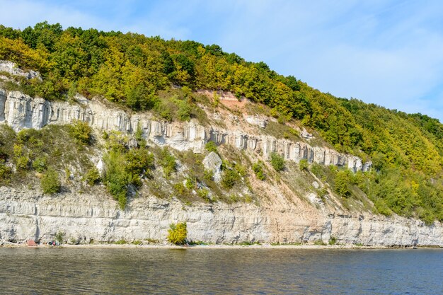 Coast of the Volga River in the middle Volga region in the Republic of Tatarstan. Autumn landscape. Photographing from the ship.