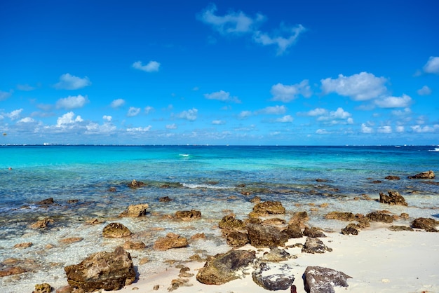 The coastline of white sand and rocks