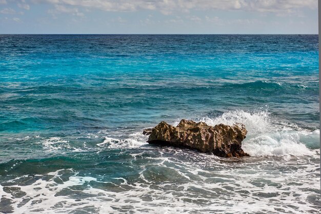 The coastline of white sand and rocks