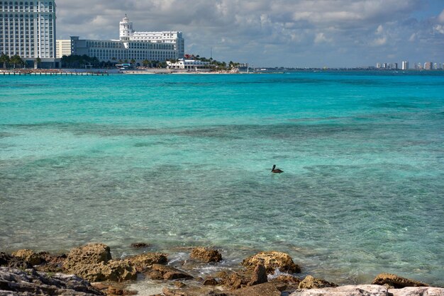 The coastline of white sand and rocks