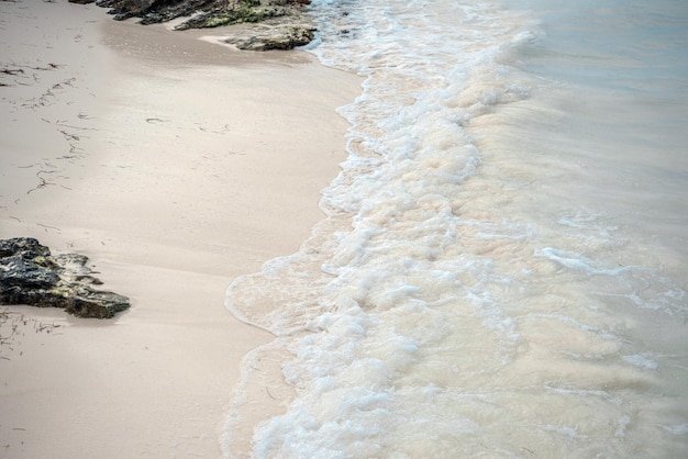 The coastline of white sand and rocks