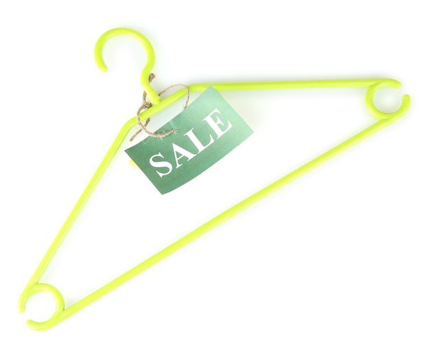 Coat hanger with sale tag isolated on white background