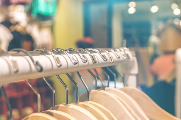 Photo coathangers hanging on rack in store