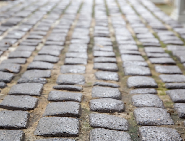 Photo cobbled road as background soft focus