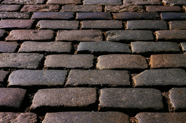 Cobblestone, stone pavement texture in the city