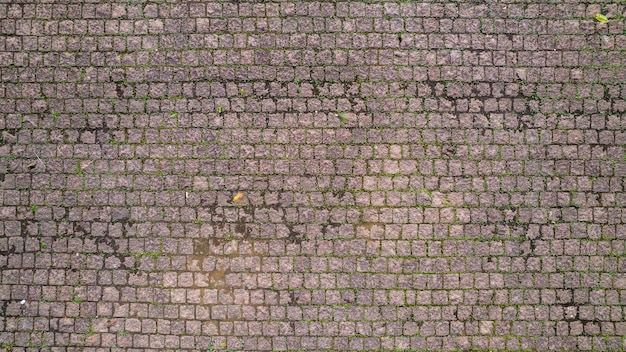 Cobblestone texture. Old stone floor, paving stone texture.