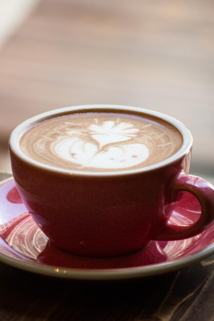 Cocaccino with Latte Art in Red Cup