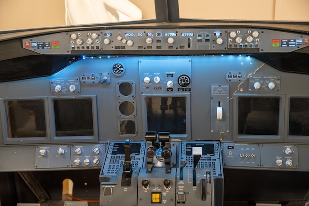 Photo cockpit of an airplane with flight instrument panel and controls