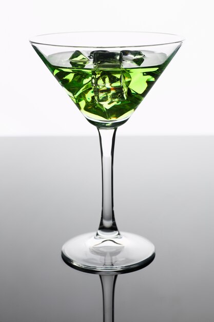 Cocktail absinthe with vodka in martini glass